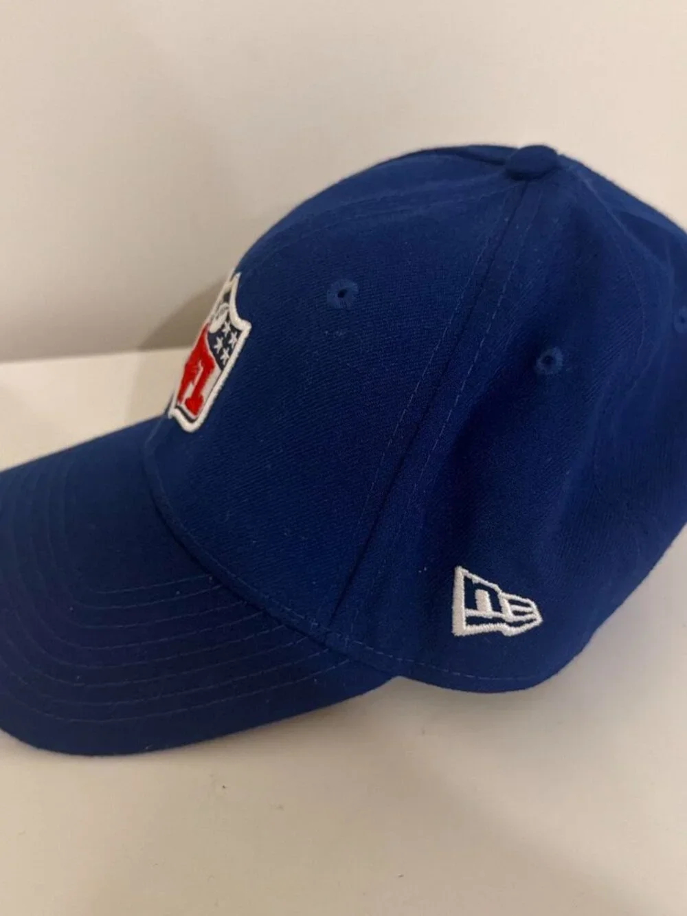 NFL blue baseball cap with embroidered logo